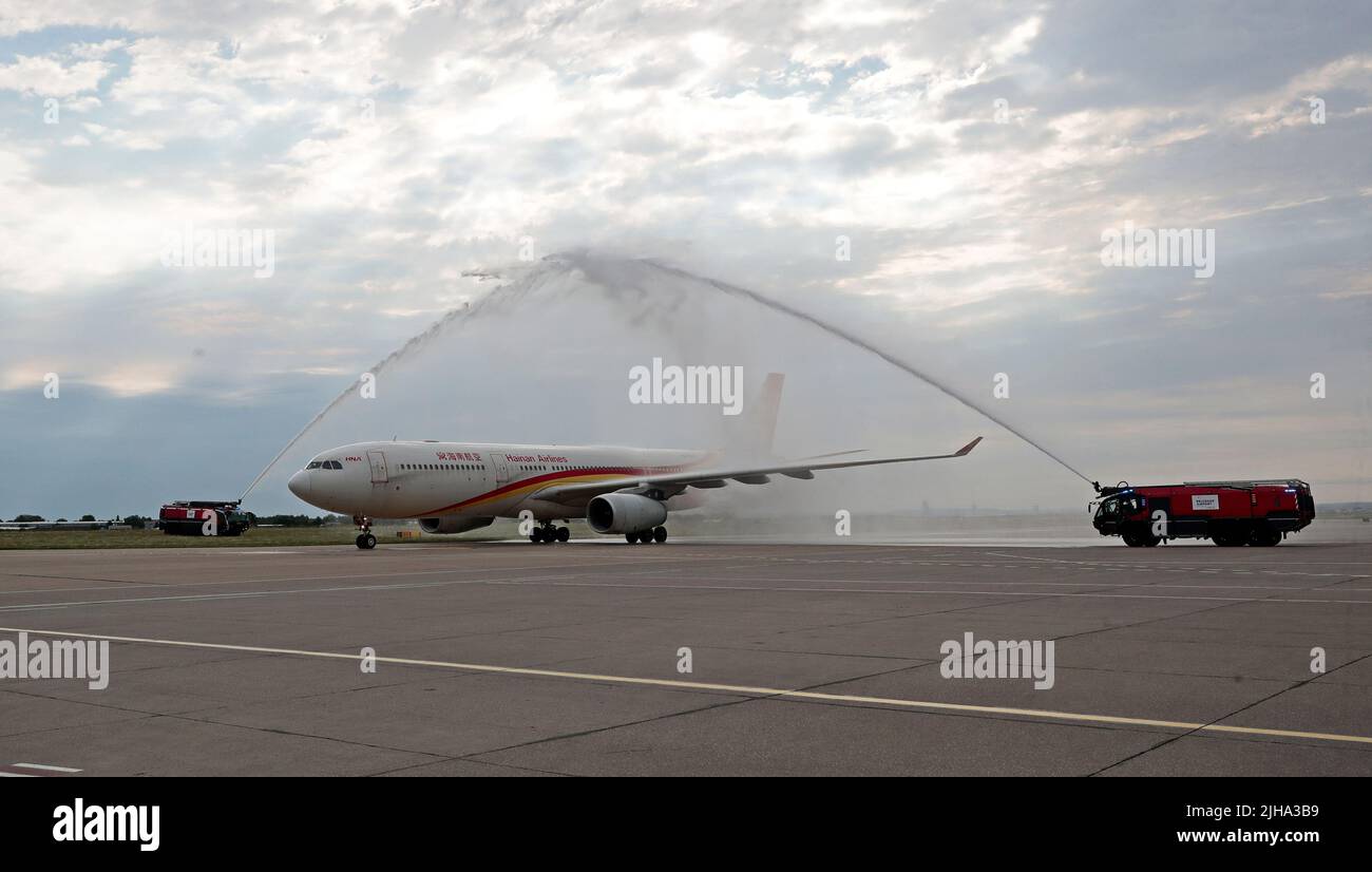 Belgrade. 16th July, 2022. A plane of Hainan Airlines is greeted by water salute at Nikola Tesla Airport in Belgrade July 16, 2022. China's Hainan Airlines on Saturday opened a direct flight to link Beijing, capital of China, and Belgrade, capital of Serbia. Credit: Predrag Milosavljevic/Xinhua/Alamy Live News Stock Photo