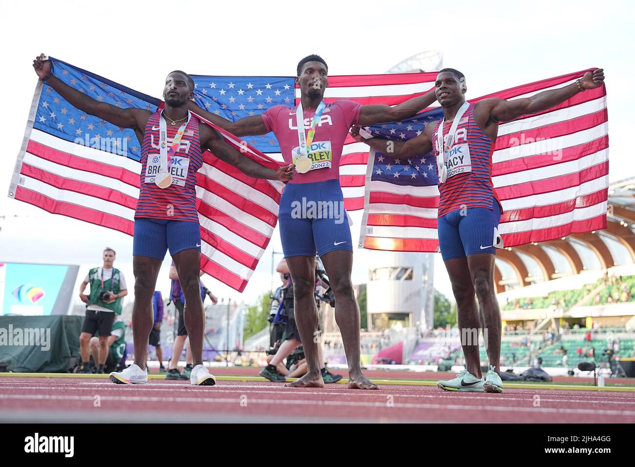 Eugene, USA. 16th July, 2022. Athletics: World Championships: Trayvon Bromell (l-r), Fred Kerley and Marvin Bracy (all USA) after the 100 m final. Fred Kerley won in 9.86 seconds. Bracy and Bromell were each stopped at 9.88 seconds, Bracy got silver, Bromell bronze. Credit: Michael Kappeler/dpa/Alamy Live News Stock Photo