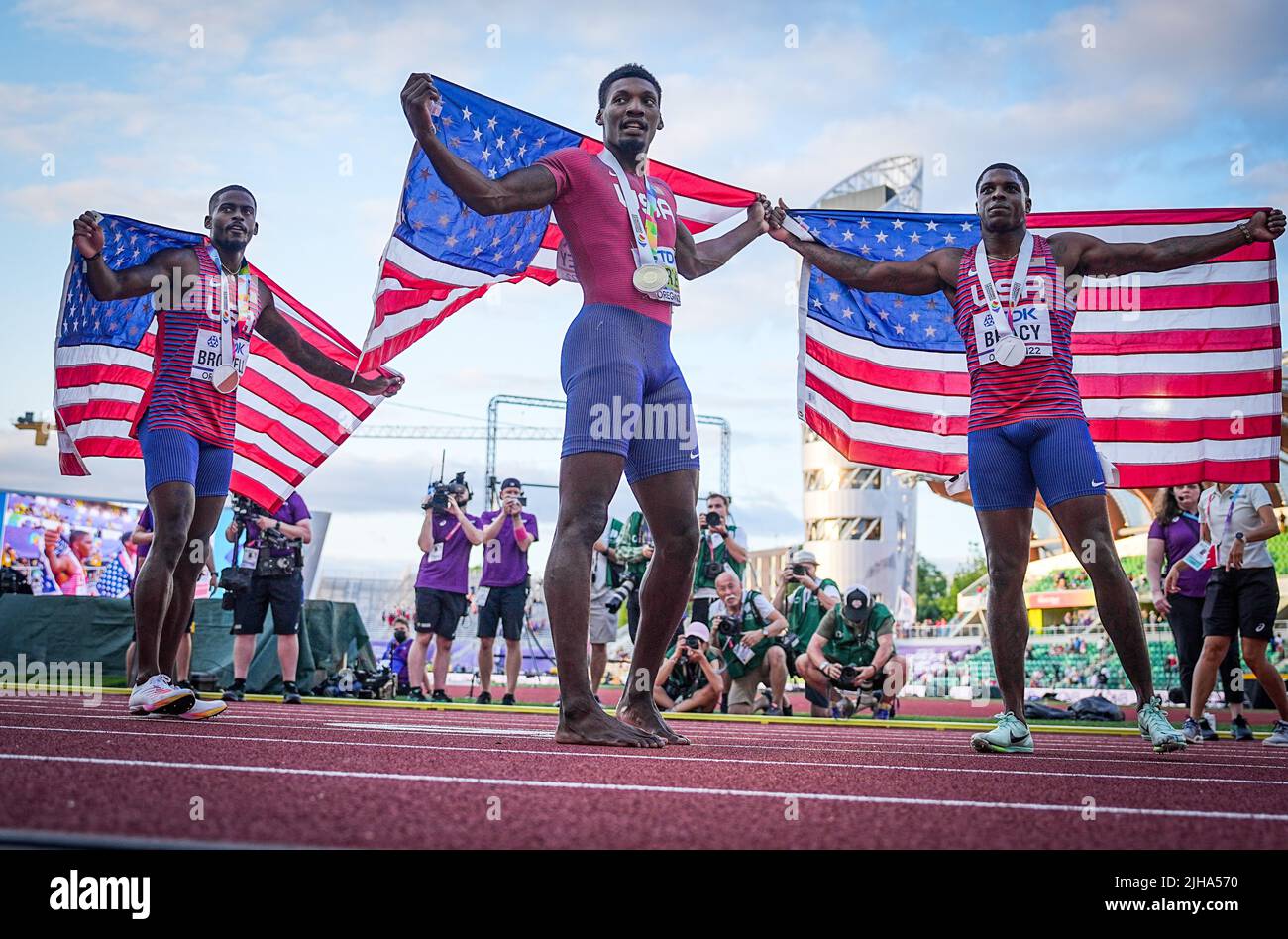 Eugene, USA. 16th July, 2022. Athletics: World Championships: Trayvon Bromell (l-r), Fred Kerley and Marvin Bracy (all USA) after the 100 m final. Fred Kerley won in 9.86 seconds. Bracy and Bromell were each stopped at 9.88 seconds, Bracy got silver, Bromell bronze. Credit: Michael Kappeler/dpa/Alamy Live News Stock Photo