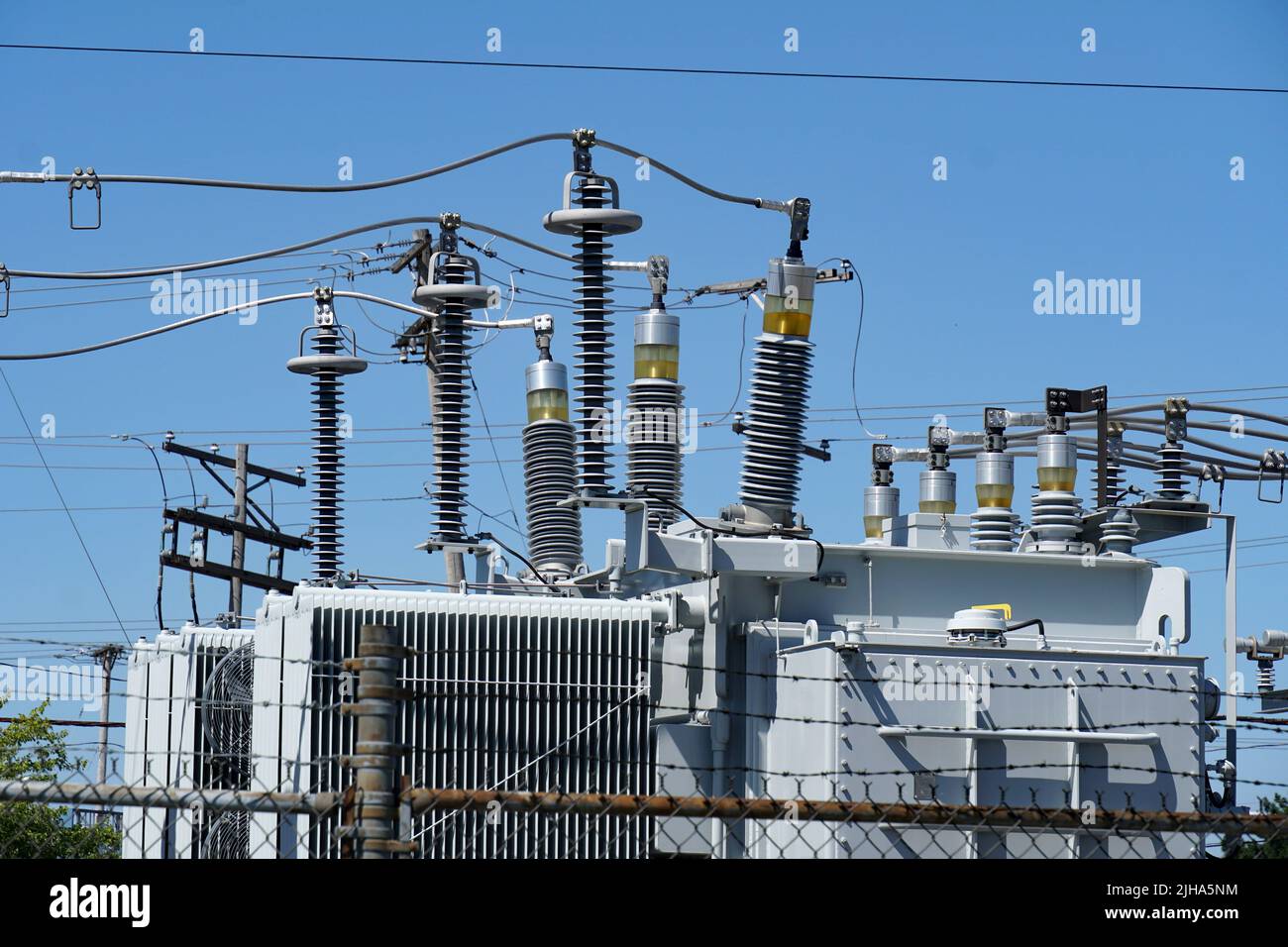 Electric power transformer at transmission substation Stock Photo