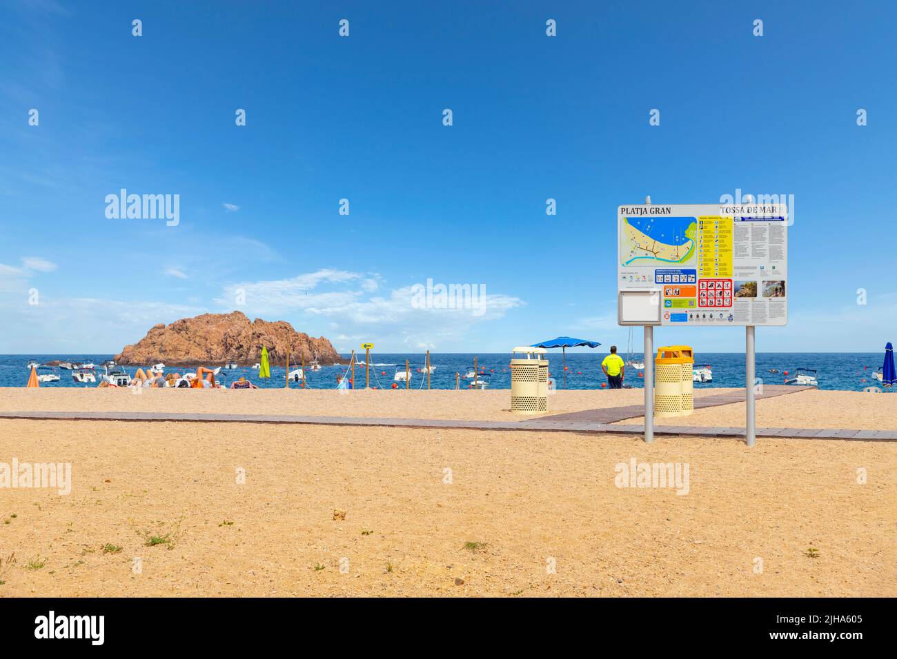 The sandy Platja Gran beach at the resort town of Tossa de Mar, Spain, on the Costa Brava coast of the Mediterranean Sea. Stock Photo