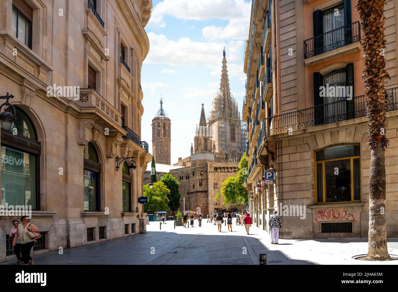 View of the tower and spires of the Gothic Barcelona Cathedral of Santa Eulalia in the Gothic Quarter, El Born district of Barcelona, Spain. Stock Photo