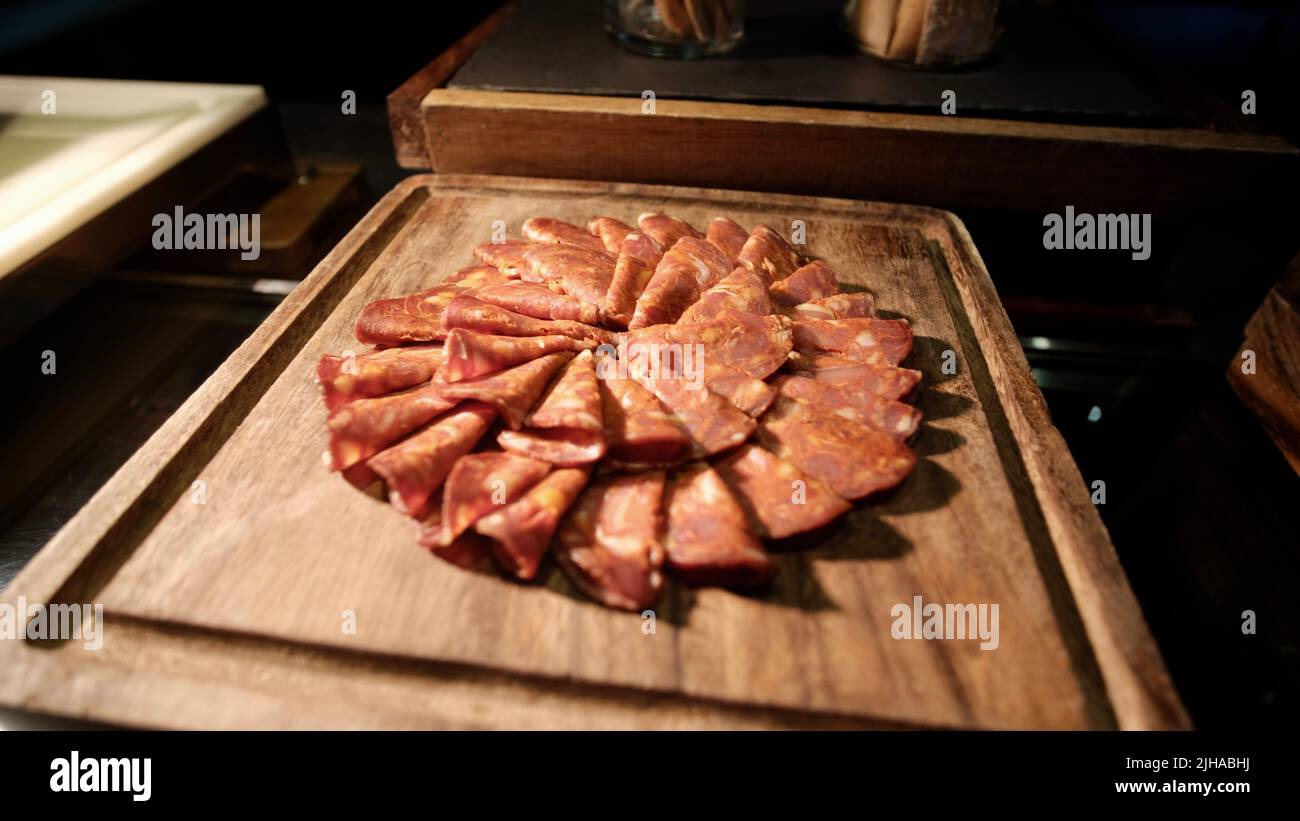 Italian Salami, Charcuterie, and Cold Cuts, Cured Meats on a Wooden