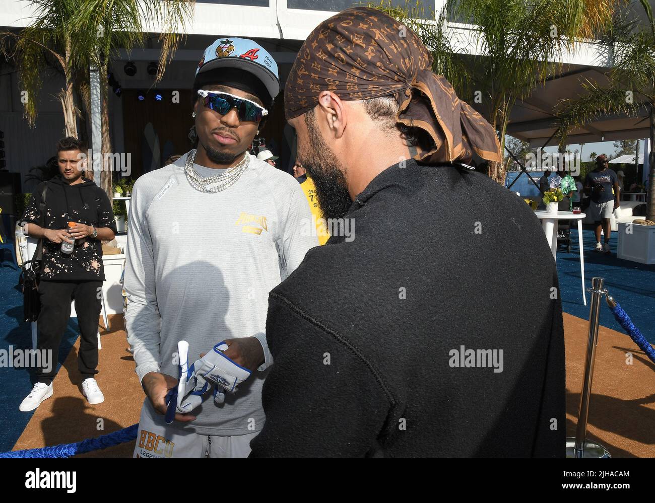 Los Angeles, USA. 16th July, 2022. (L-R) Quevo and Jerry Lorenzo at the 2022  MLB All-Star Celebrity Softball Game Media Availability held at the 76  Station - Dodger Stadium Parking Lot in