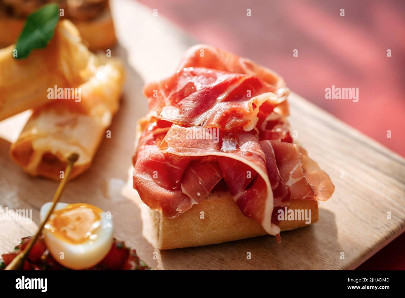 Closeup on bruschetta with italian prosciutto ham Stock Photo