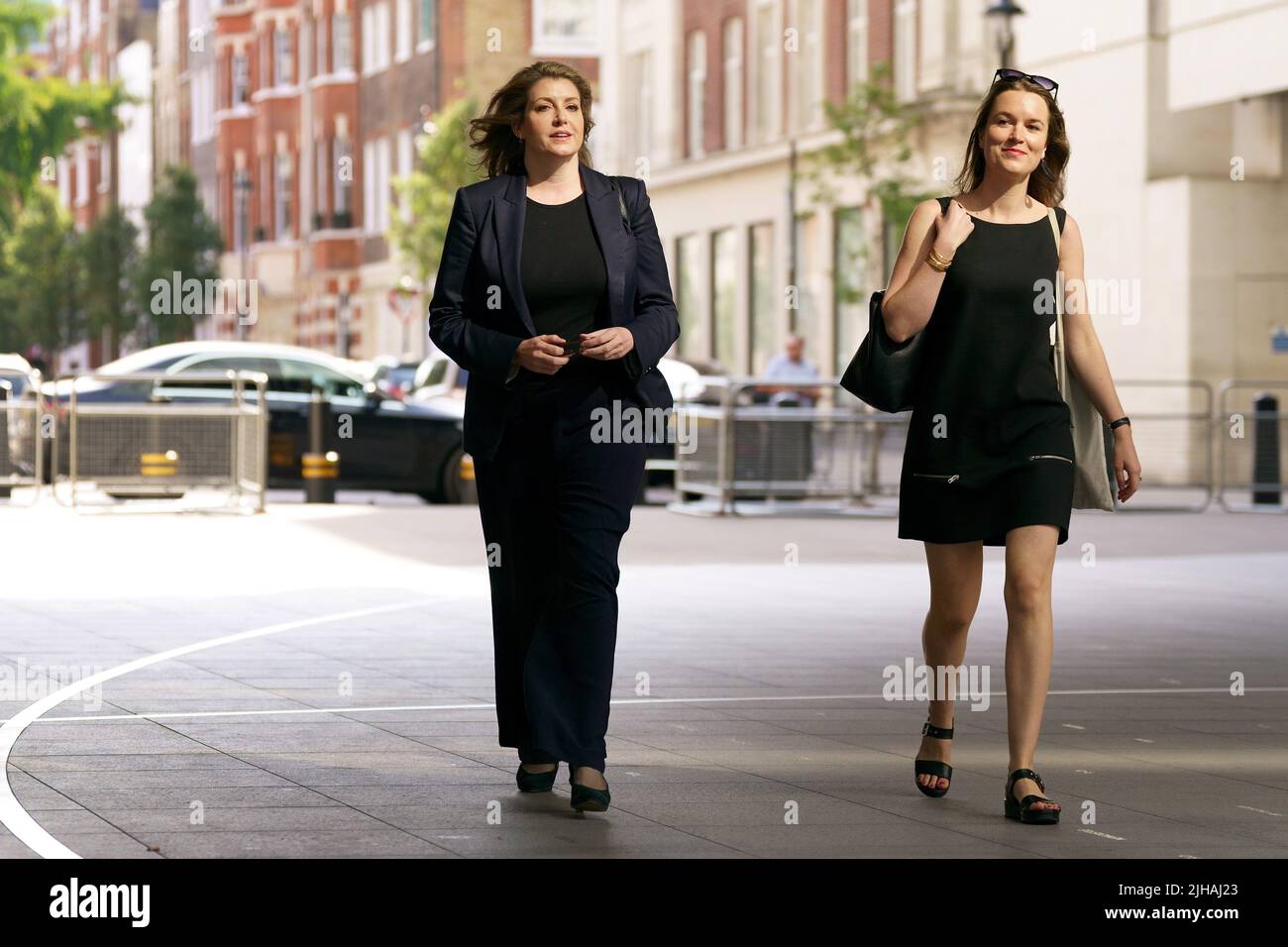 Penny Mordaunt (centre) arrives at BBC Broadcasting House in London, to appear on the BBC One current affairs programme, Sunday Morning. Picture date: Sunday July 17, 2022. Stock Photo