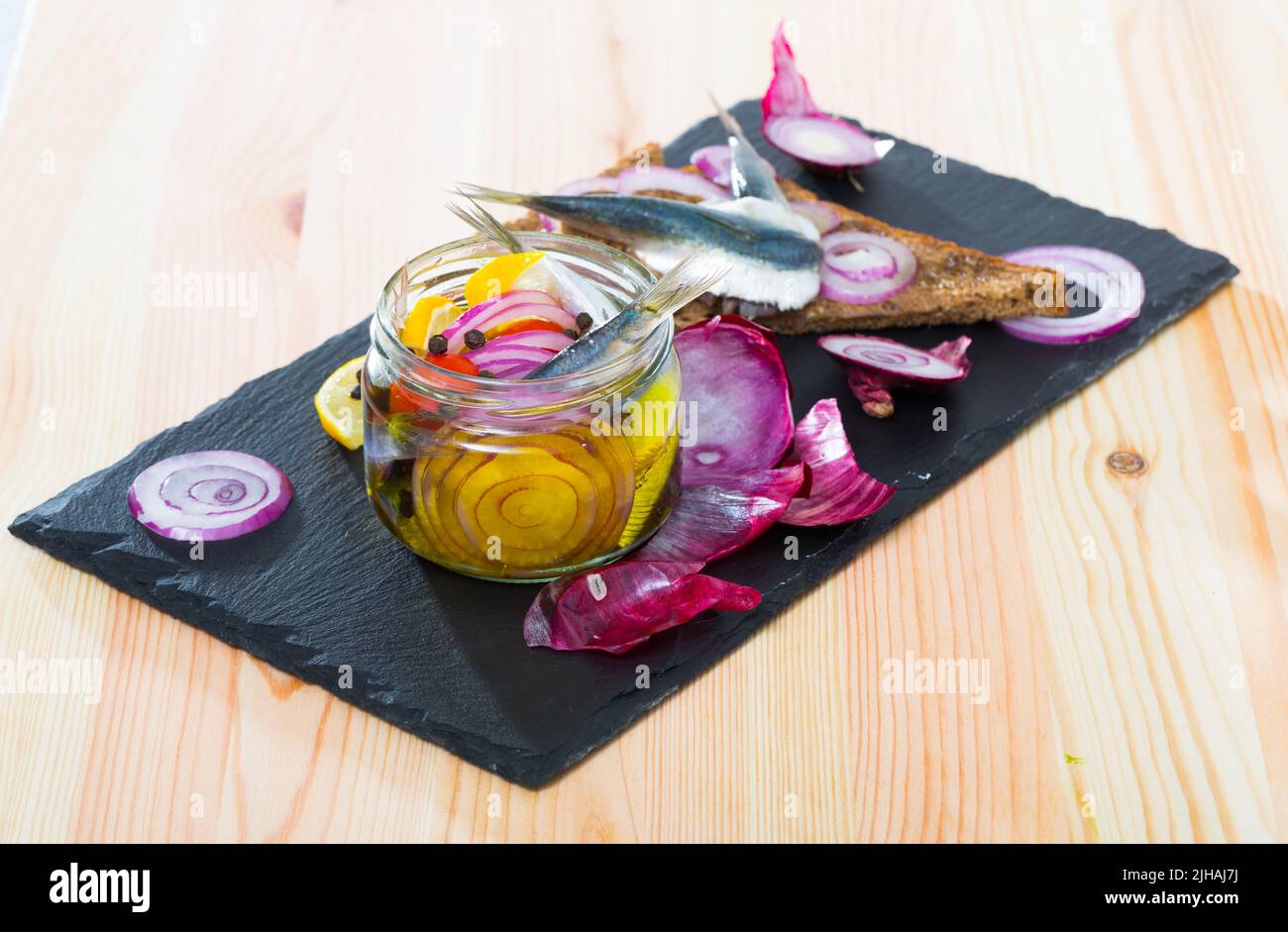 Pickled anchovies in homemade marinade Stock Photo Alamy