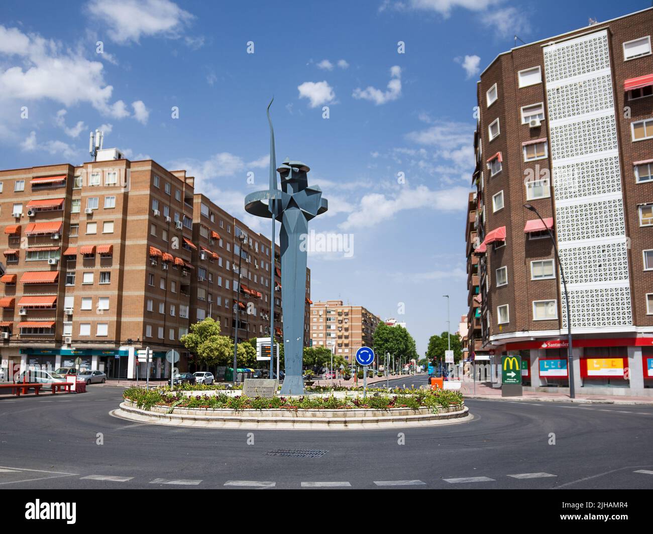 Alcalá de Henares, Spain - June 18, 2022: Stylized sculpture of Don Quixote of La Mancha in a crossroads of the hometown of the writer Cervantes Stock Photo