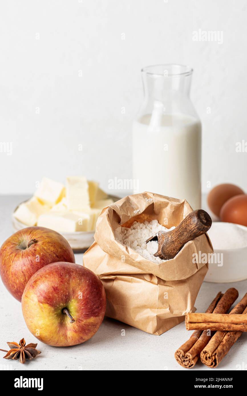 Baking ingredients for homemade apple cake or pie flour, eggs, milk