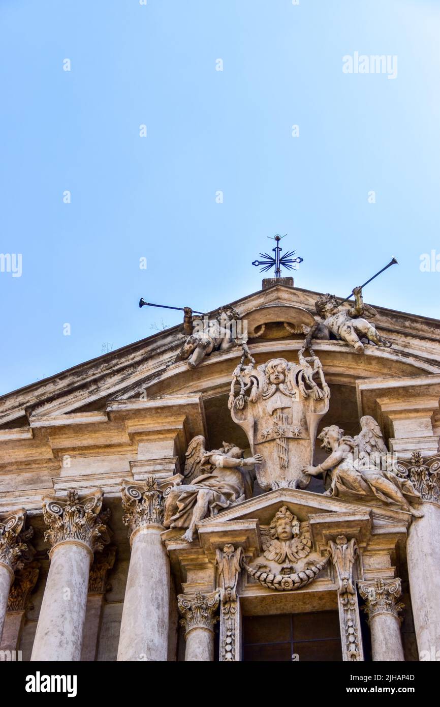 The vertical view of the Baroquue church Saints Vincent and Anastasius at Trevi in Rome Stock Photo
