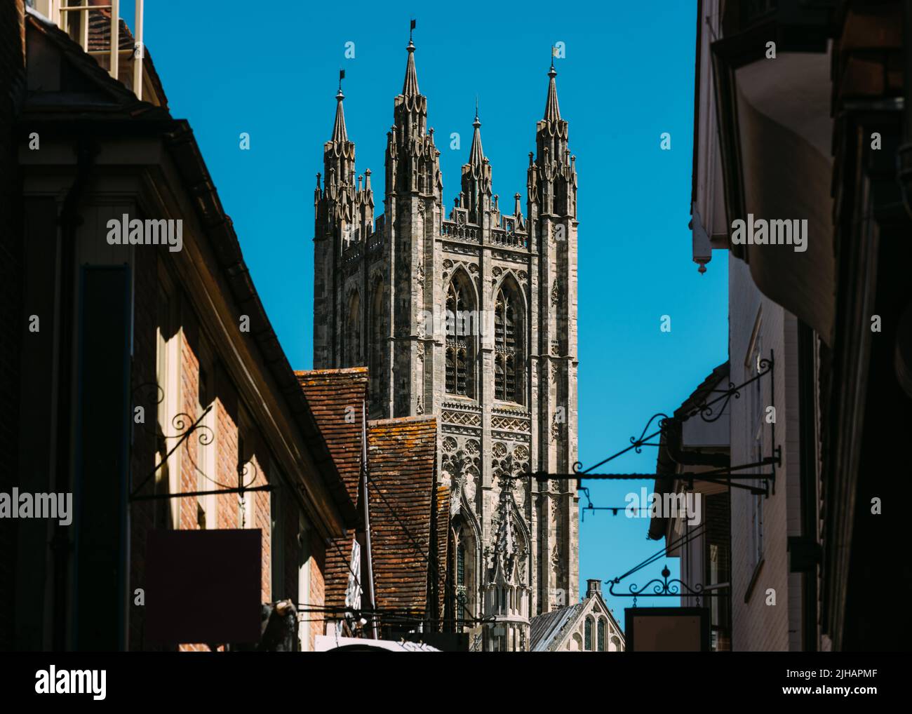 Juxtaposition view of Gothic Canterbury Cathedral, one of the oldest and most important Christian sites in England Stock Photo