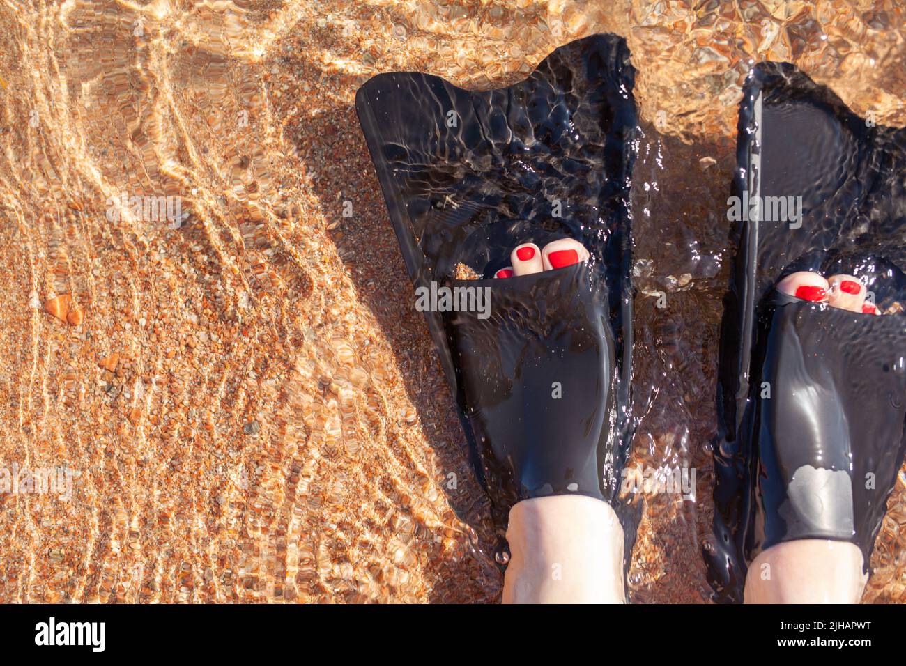 Water swimming feet sand woman hi-res stock photography and images - Alamy