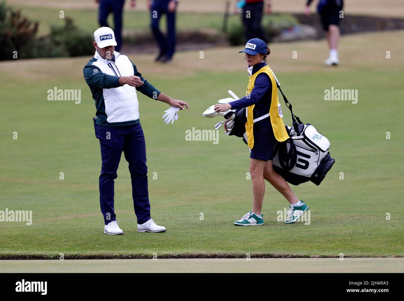 England's Lee Westwood with caddie and wife Helen Storey (right) on the