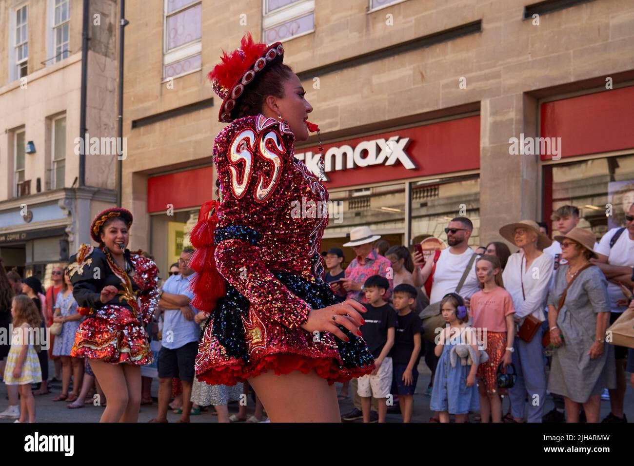 Caporales dancers in ornate costumes performing at the annual carnival