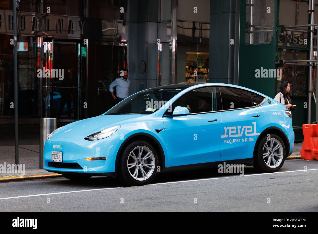 A Revel Ride Share Taxi with Tesla Model Y in Times Square New York