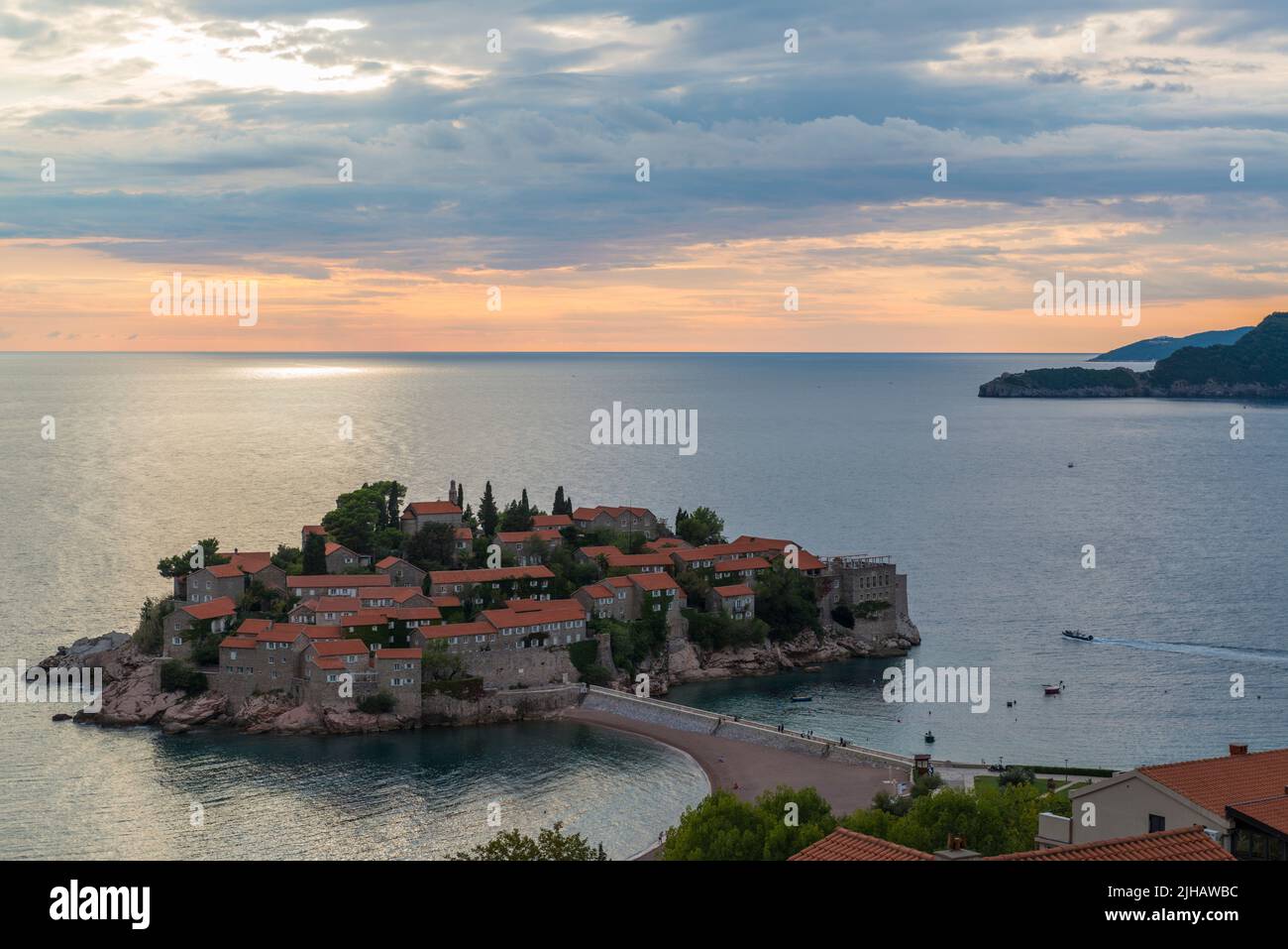 Sunset at the islet of Sveti Stefan. Montenegro Stock Photo