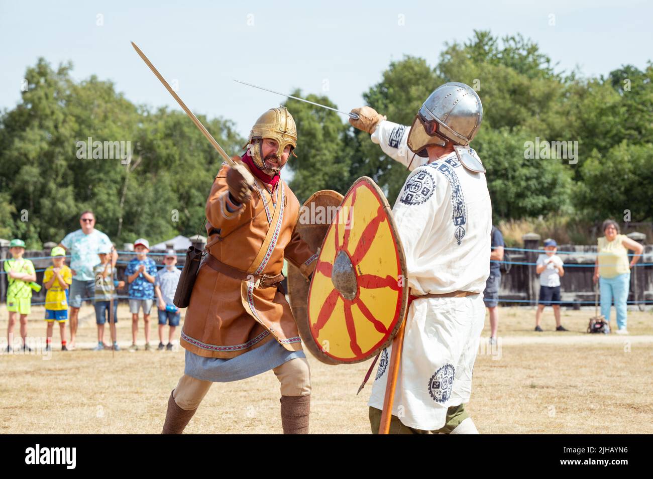 Coventry, West Midlands, UK. 17th July 2022. Roman era re-enactors at Lunt Roman Fort cool off between battles. The fort is hosting a Roman Festival this weekend. Stock Photo