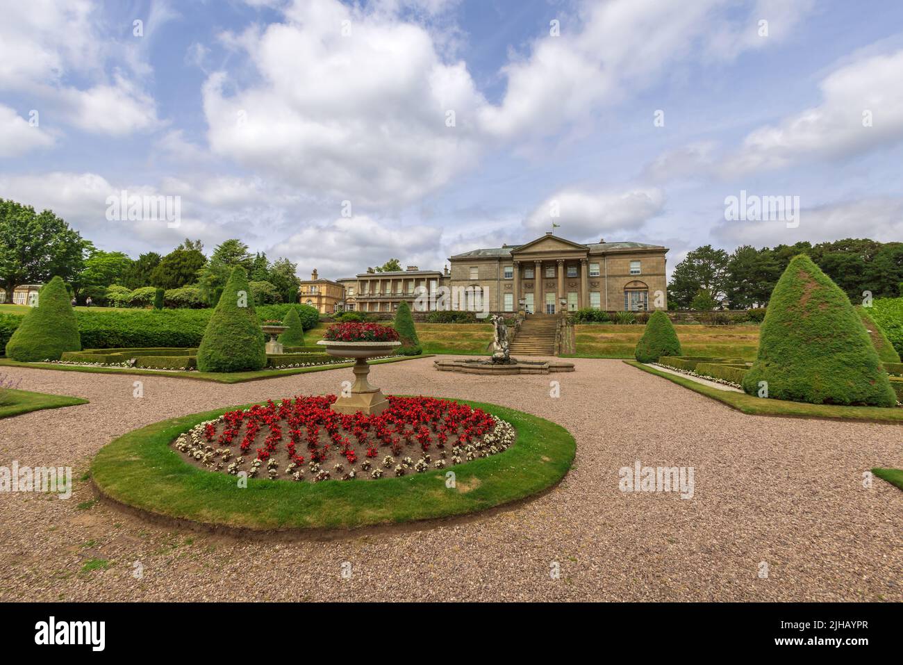 The South facade and formal gardens of historic Tatton Hall park and estate in Cheshire, England. Stock Photo
