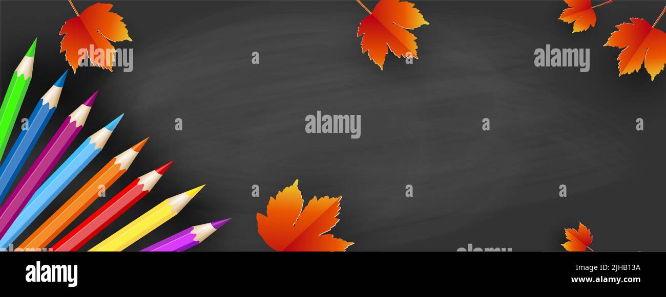 Back to School - blackboard with colored pencils and autumn leaves ...