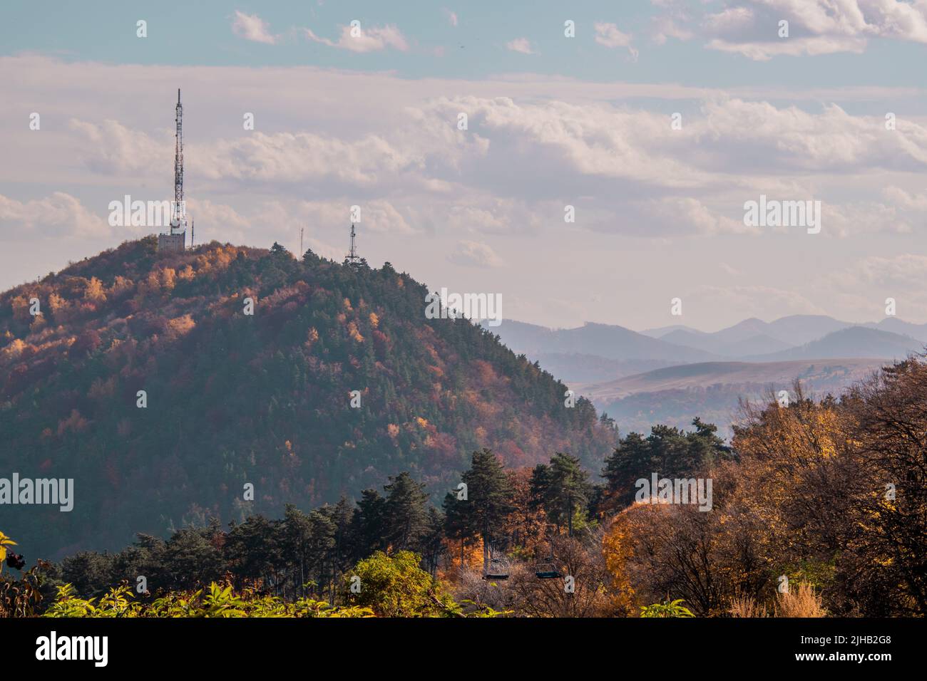A tower antenna on the top of the hill in Piatra Neamt, Romania Stock Photo