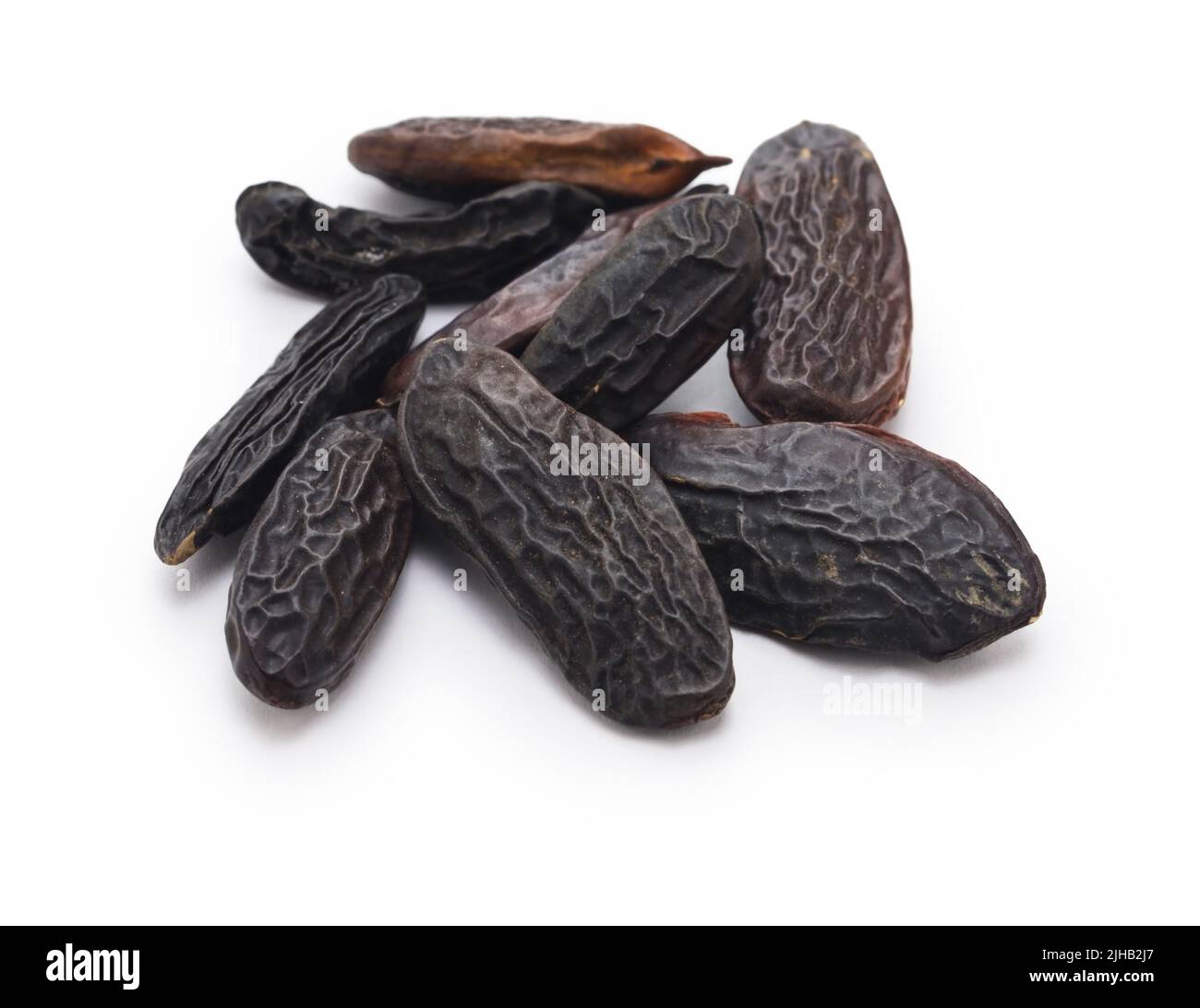 Tonka beans isolated on white background. Bean of Dipteryx odorata, cumaru  or kumaru. Fresh aroma tonka beans Stock Photo - Alamy