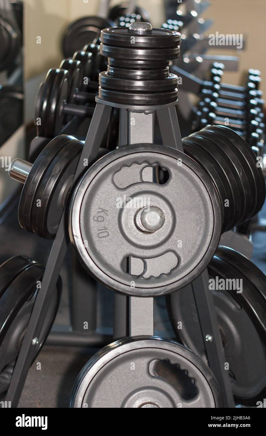 Barbell plates holder rack in the gym Stock Photo Alamy