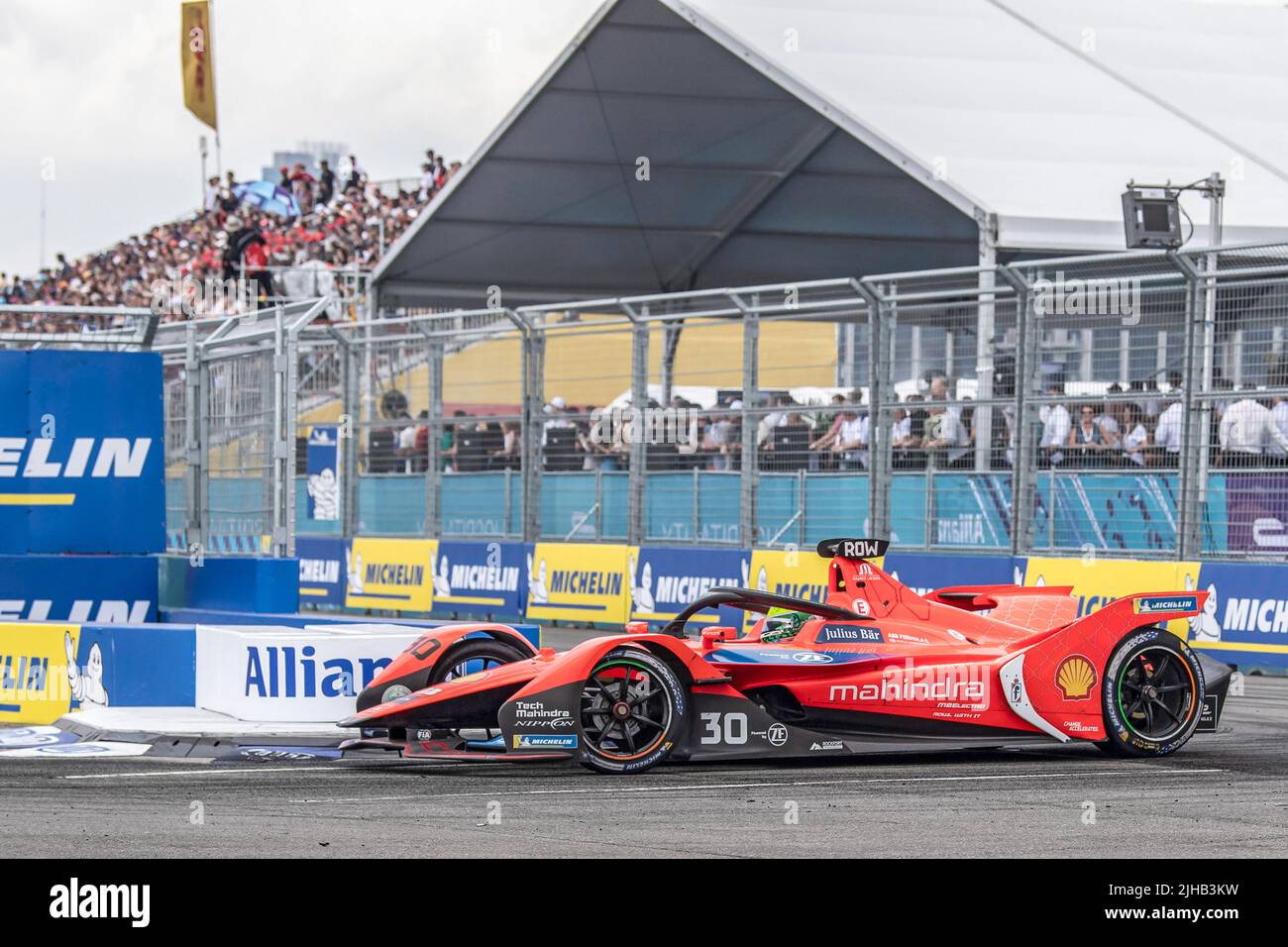 Oliver Rowland (car no. 30) of Mahindra Racing drives during the ABB FIA Formula E Championship, New York City E-Prix Season 8 Round 11 in the Brooklyn borough of New York City. Stock Photo