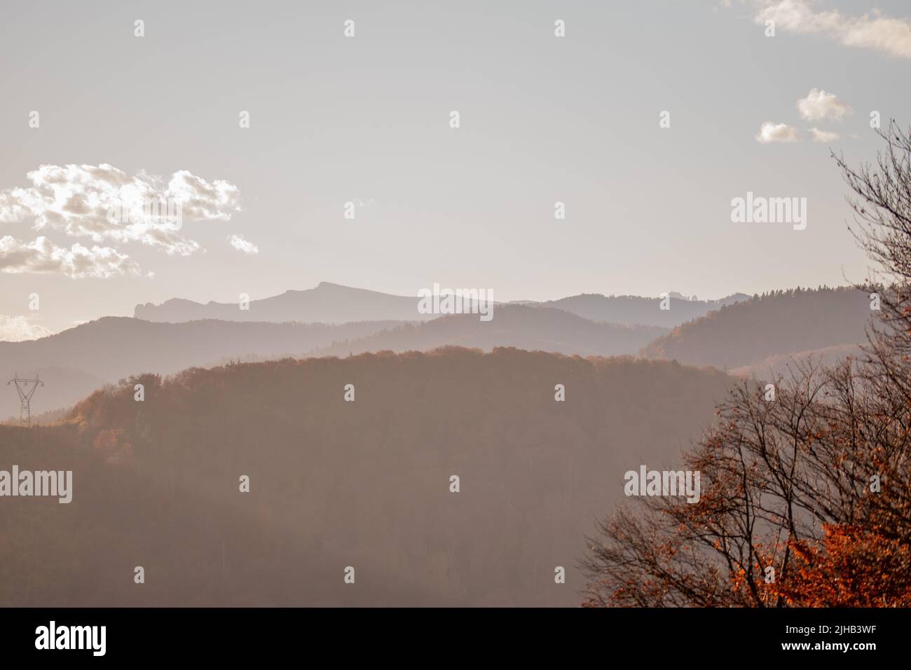 A silhouette of hills in Piatra Neamt, Romania on the sunrise Stock Photo