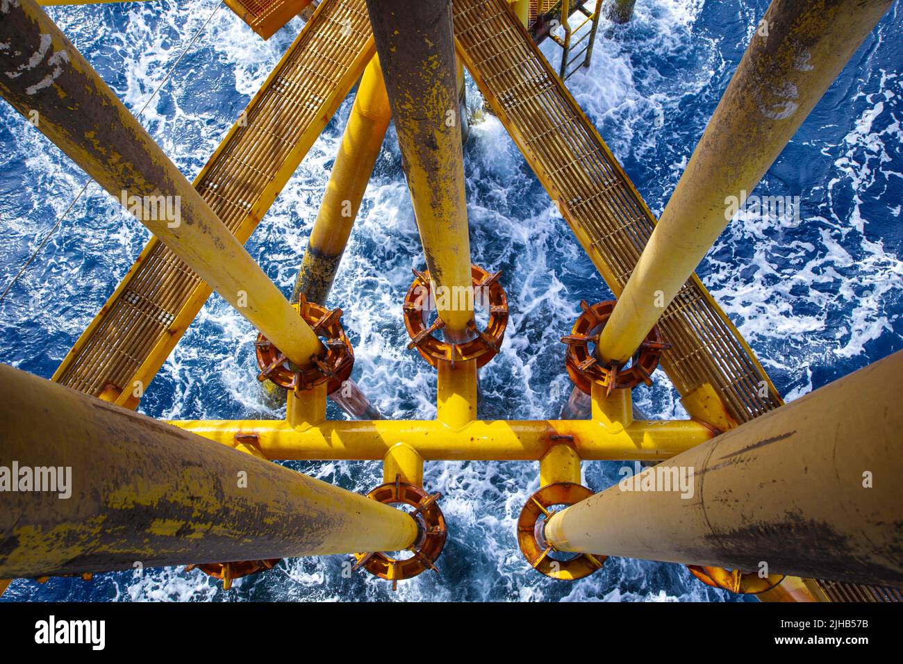 Offshore drill yellow oil and gas wave sea production petroleum