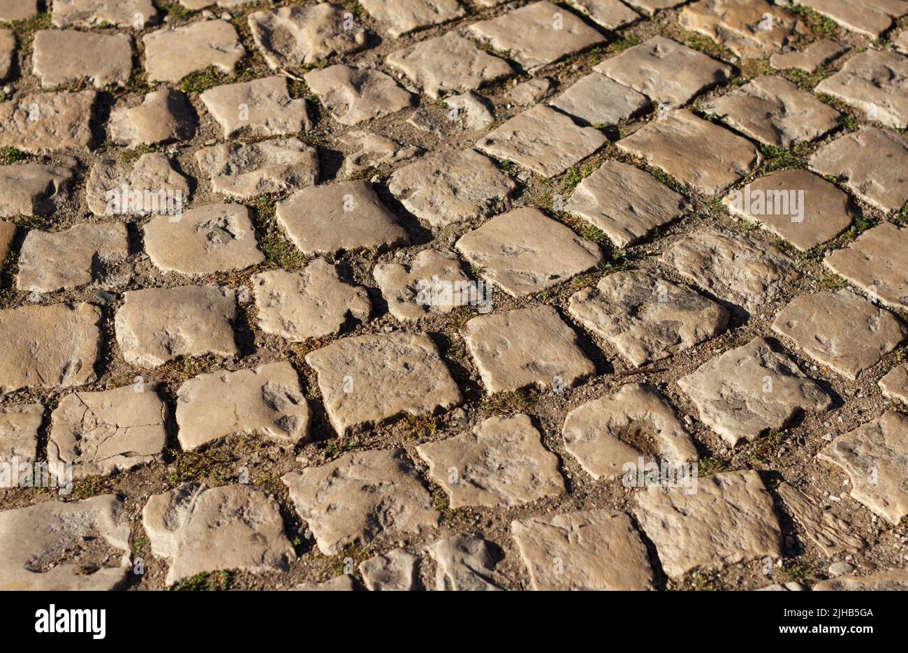 Ancient sidewalk from a stone blocks Stock Photo