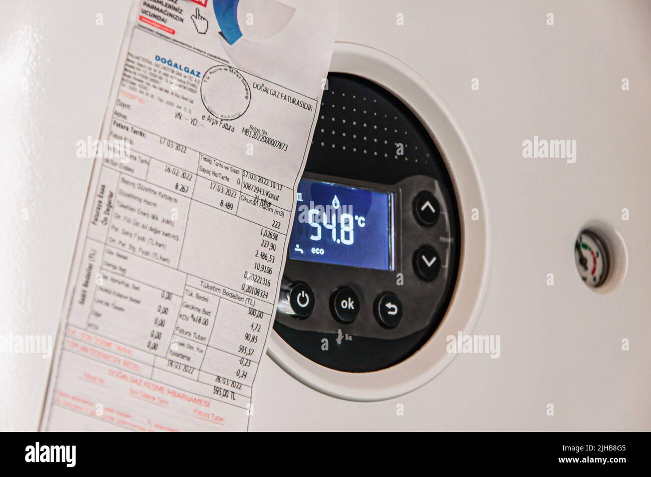 Gas prices heating costs bill on a heating gas boiler at home. The symbolic image of the heating season at home. A concept image for gas bill increase Stock Photo