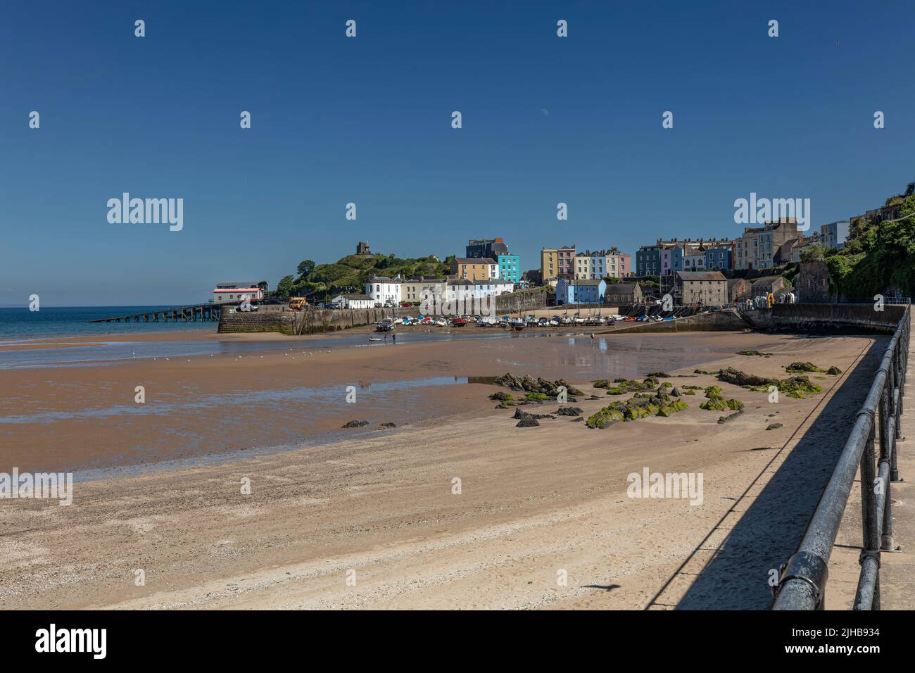 Tenby looking towards the harbour and beach at low tide Stock Photo