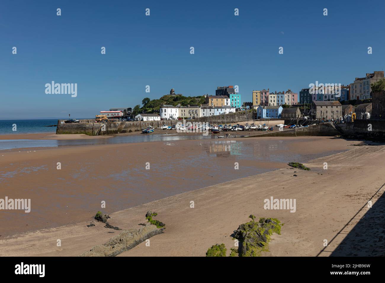 Tenby Harbour at low tide Stock Photo