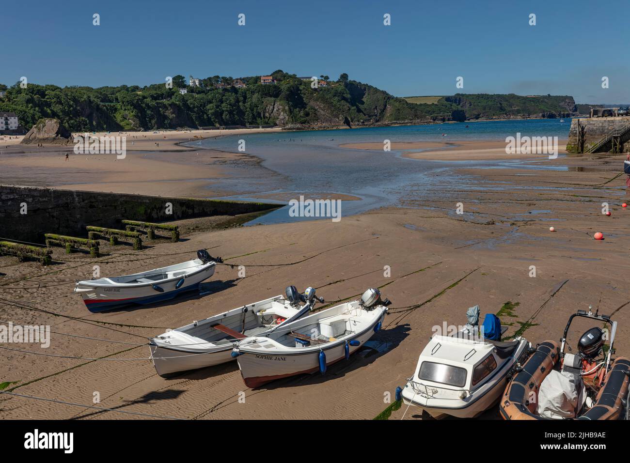 Harbour with the tide out at Tenby in Wales Stock Photo
