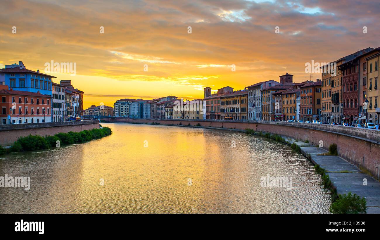 Pisa, Italy - September 4, 2014: Panoramic view of The Old Town of Pisa at sunset with glowing sky Stock Photo