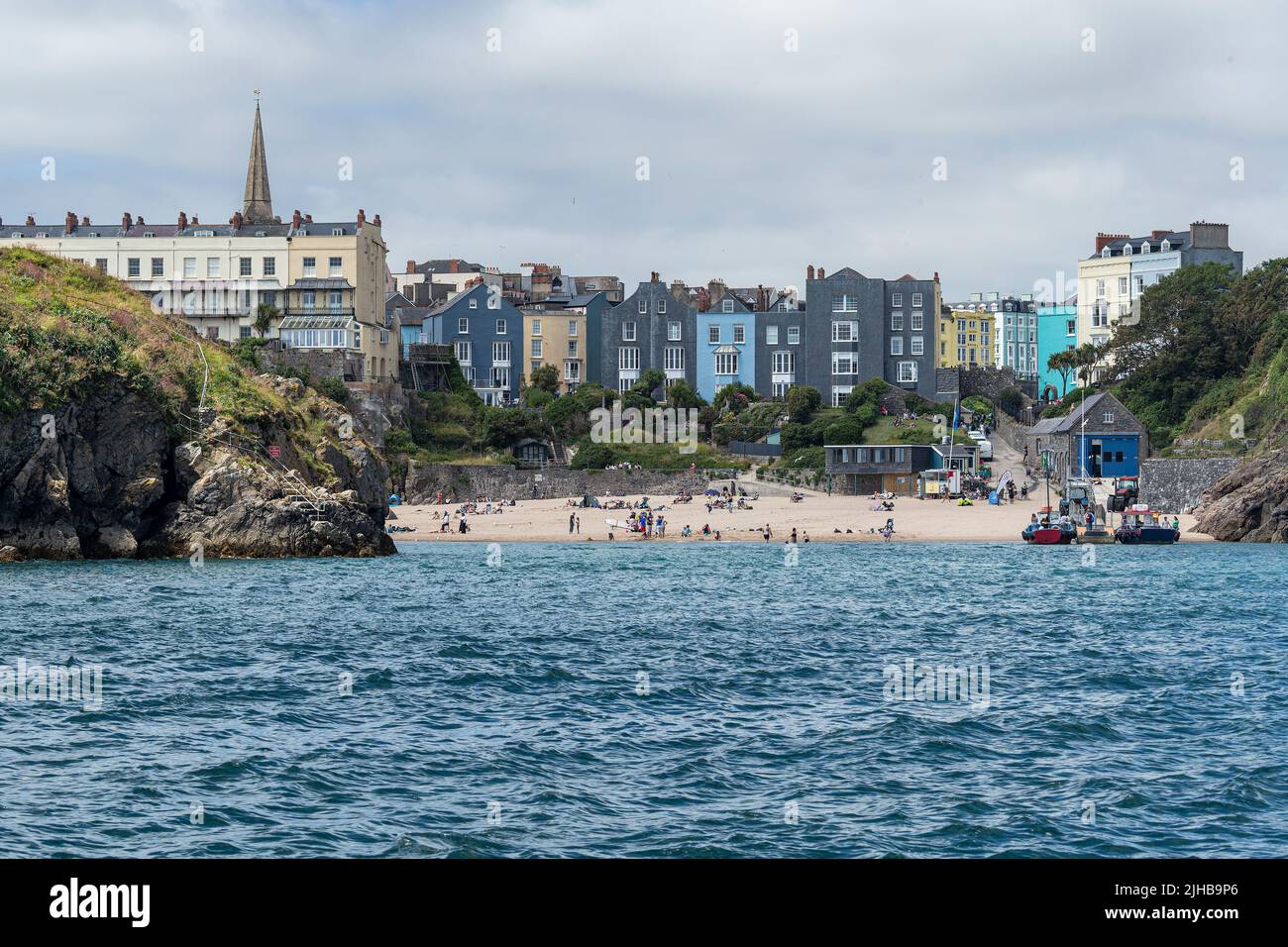 View of the beach and Tenby from the sea Stock Photo
