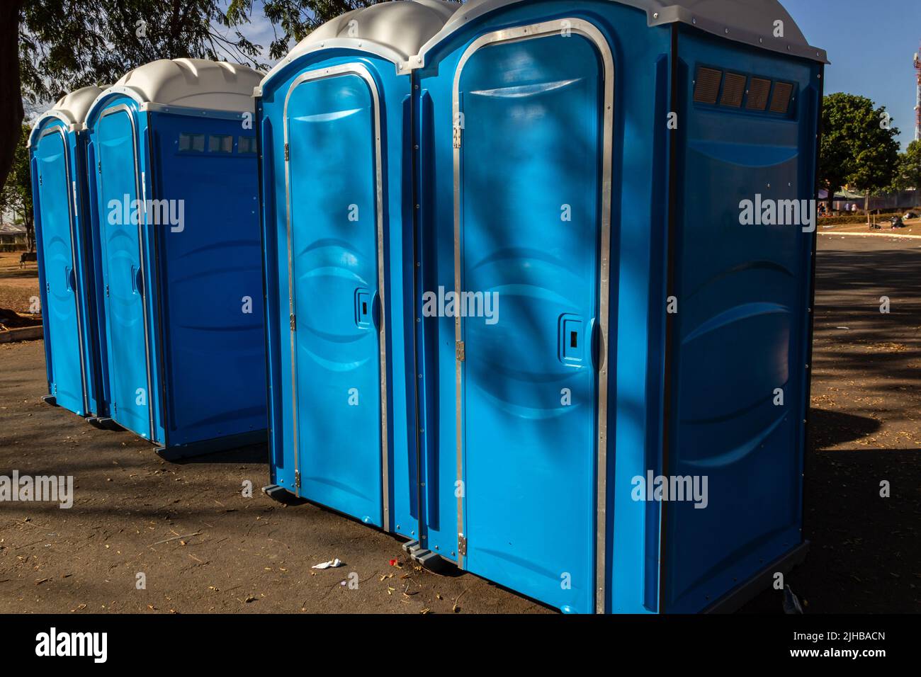 Goiania, Goiás, Brazil – July 17, 2022:  A few chemical toilets lined up in a square after a public event. Stock Photo