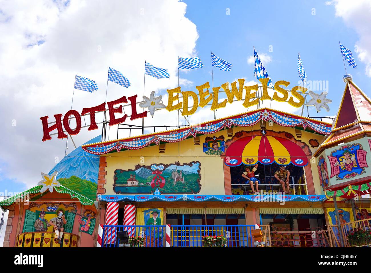 The fun house 'Hotel Edelweiss', a new attraction at the popular fun fair 'Rheinkirmes' 2022 in Düsseldorf/Germany, the biggest fun fair on the Rhine. Stock Photo