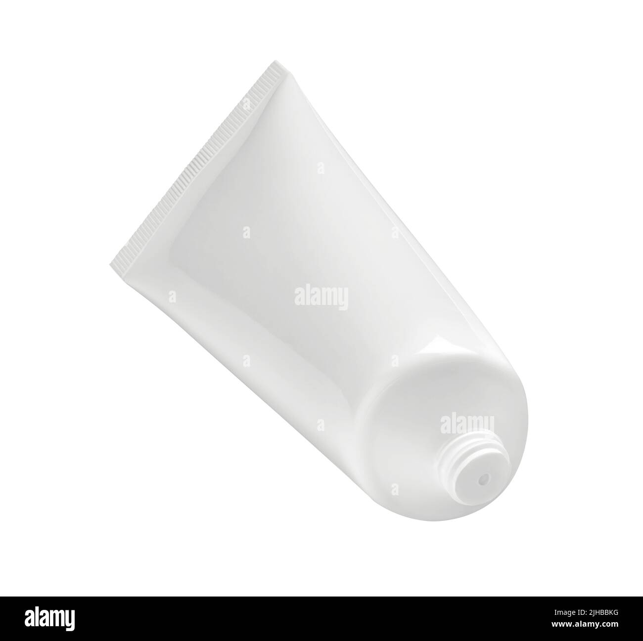 close up of a white beauty cream or a toothpaste tube on white ...
