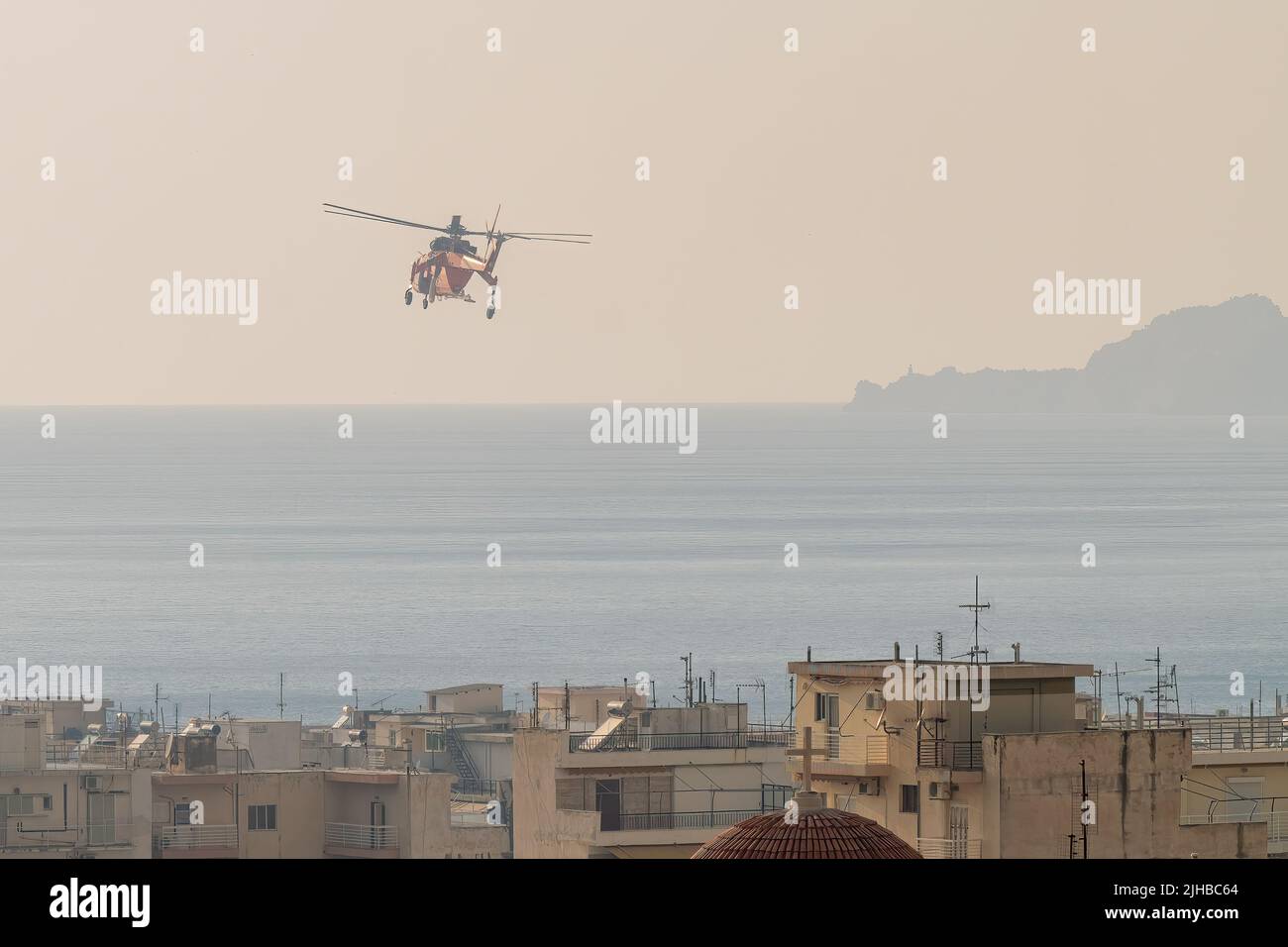 Loutraki, Greece 14 September 2019. Fire helicopter against the sky at Loutraki in Greece. Stock Photo