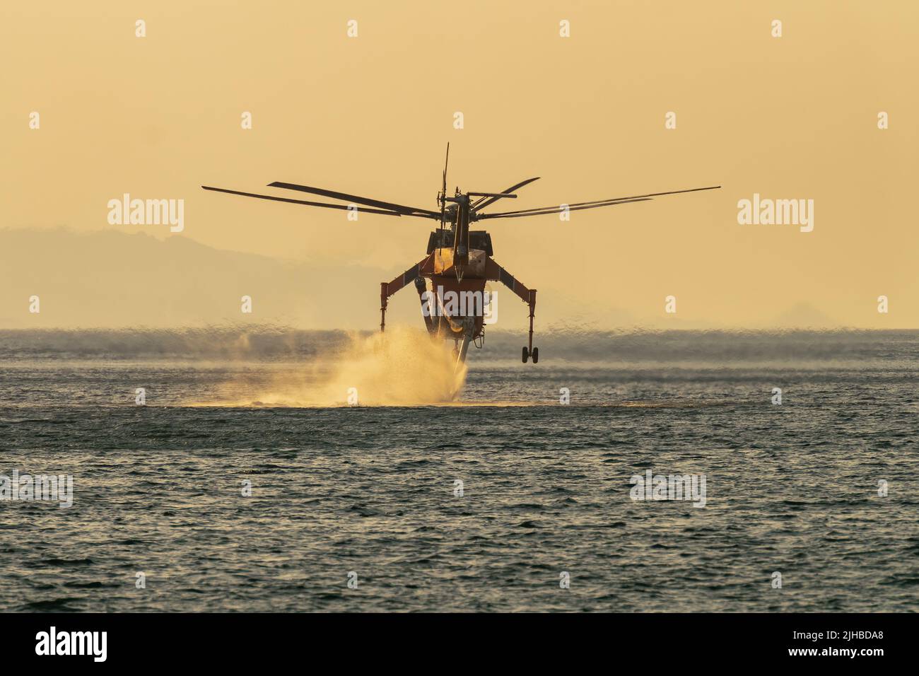 Loutraki, Greece 14 September 2019. Fire helicopter Sikorsky S-64 up in the sky at Loutraki in Greece for the big fire. Stock Photo