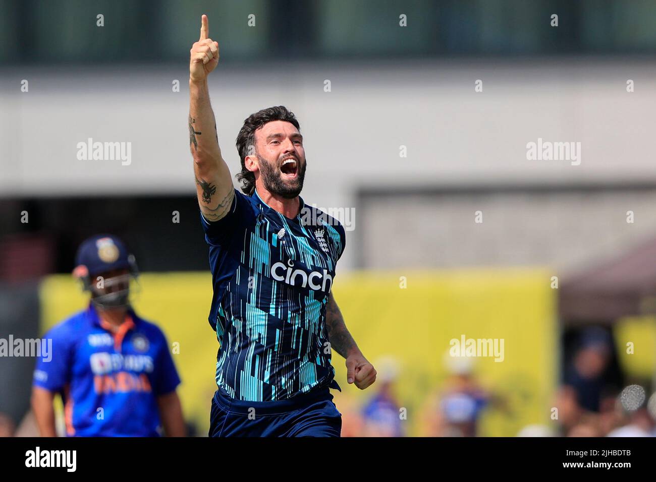 Reece Topley of England celebrates taking the wicket of Virat Kohli of ...