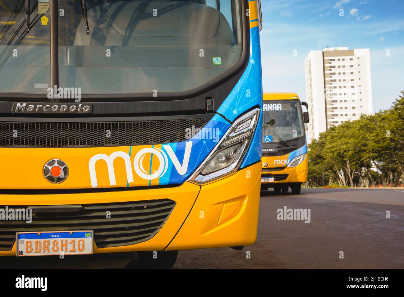 Parked bus waiting for passenger service at the bus terminal. Stock Photo