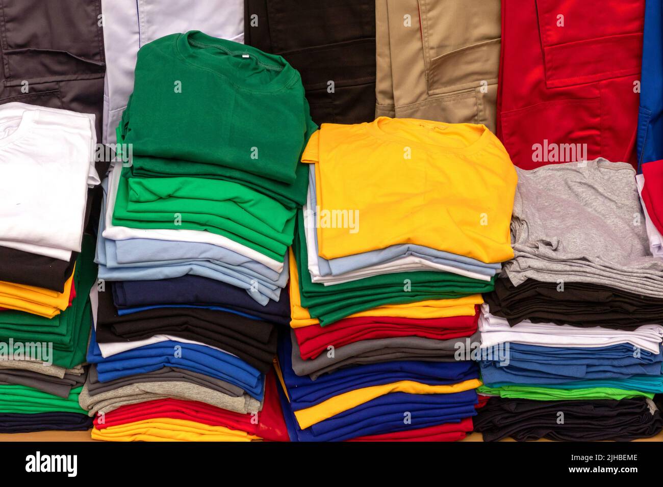 Pile colorful t shirts hi-res stock photography and images - Alamy