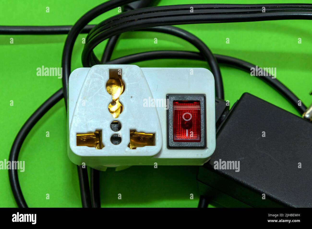 Universal electric travel adapter plug with a switch Stock Photo