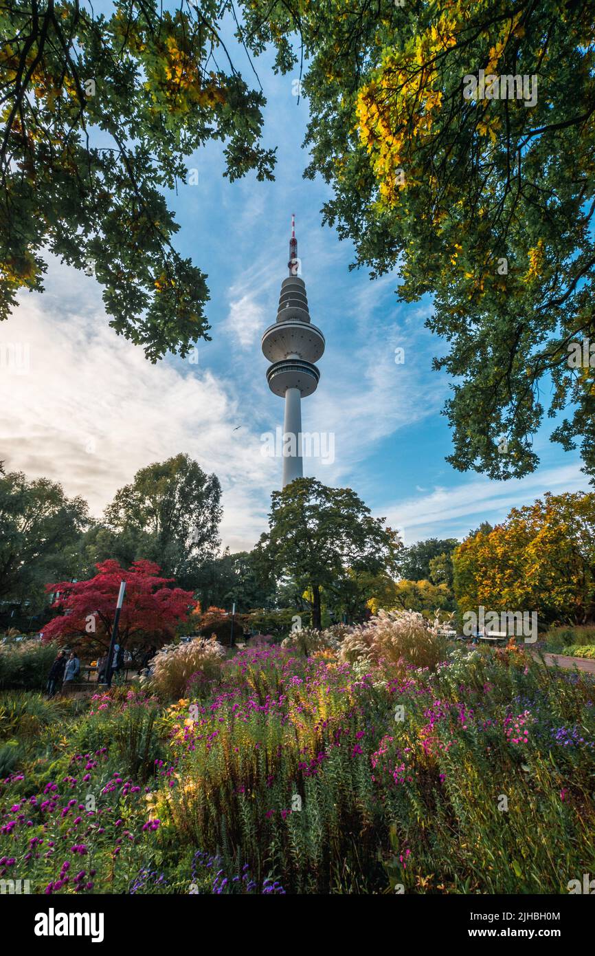 City park Planten un Blomen at autumn. View of Heinrich Hertz Tower is