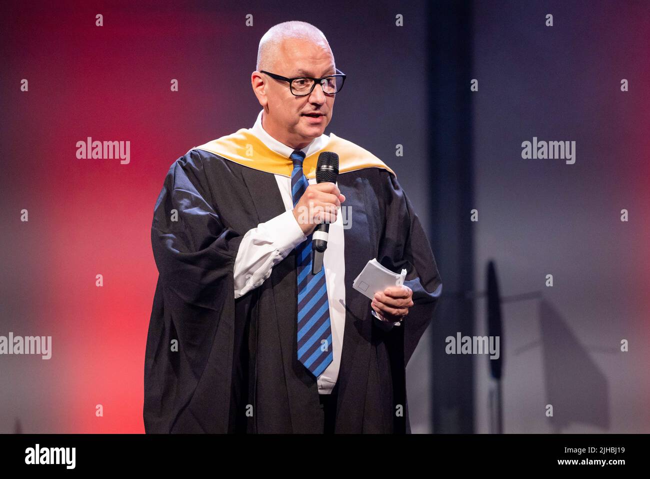 Graduation day at UA92, Manchester - 10th July 2022. Phil Jones, ex BBC now lecturer in sports journalism at UA92. Stock Photo