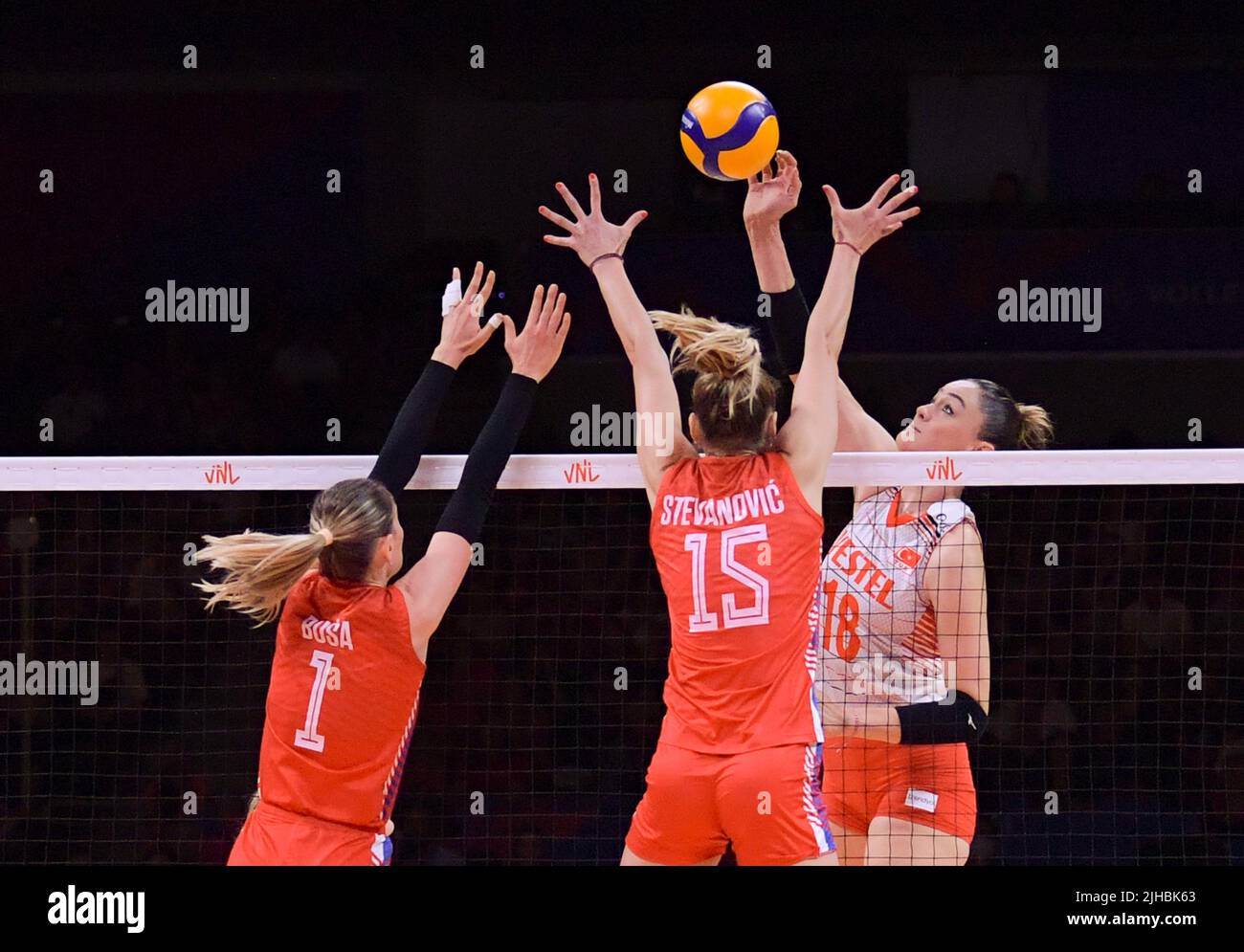 Ankara, T¨¹rkiye. 17th July, 2022. Gunes Zehra (R) of T¨¹rkiye spikes the ball during the 2022 FIVB Volleyball Women's Nations League bronze medal match between Serbia and T¨¹rkiye in Ankara, T¨¹rkiye, July 17, 2022. Credit: Shadati/Xinhua/Alamy Live News Stock Photo