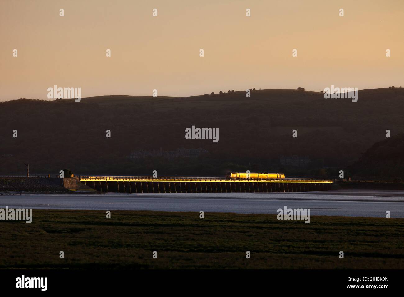 Network Rail Infrastructure monitoring train crossing Arnside viaduct