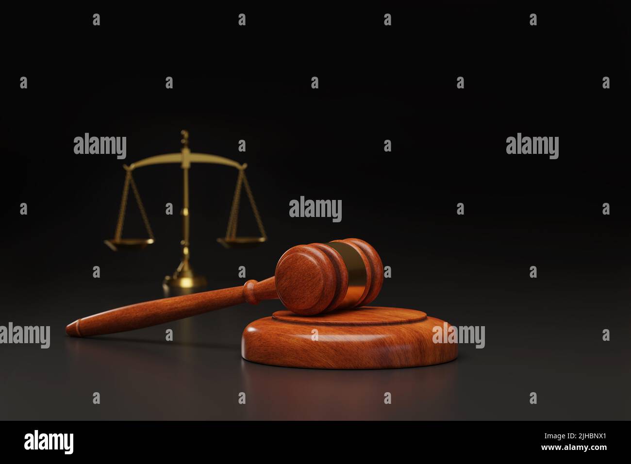 Wooden gavel and justice scales with copy space on dark background ...
